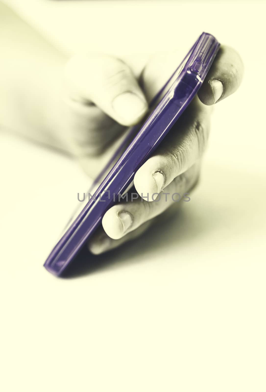 Using mobile phone, detail of a hand using a mobile phone the latest generation, technology