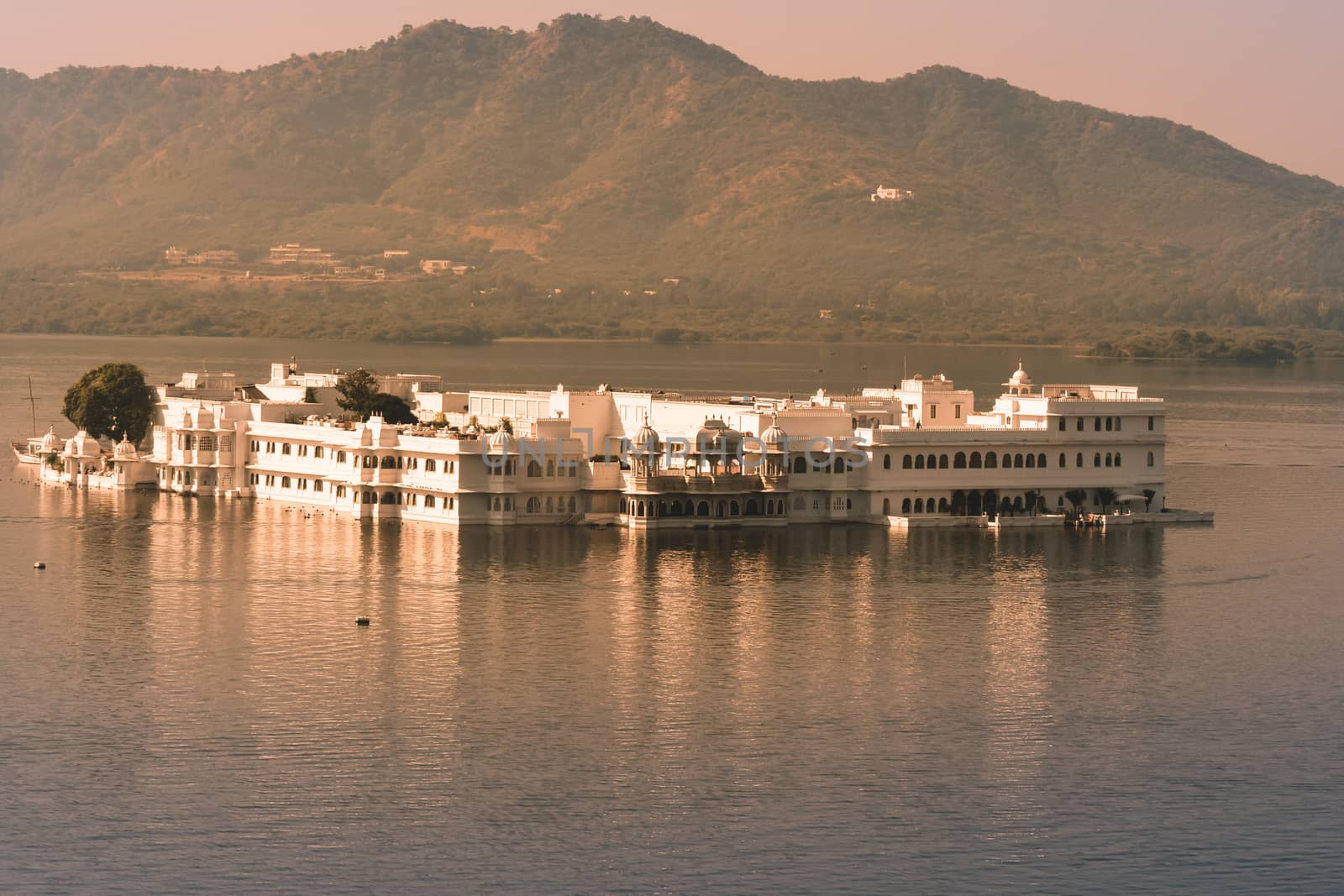 Tranquil view of reflection on water of "JAL MAHAL", famous historical architectural palace of Jaipur City, Rajasthan, India, Asia