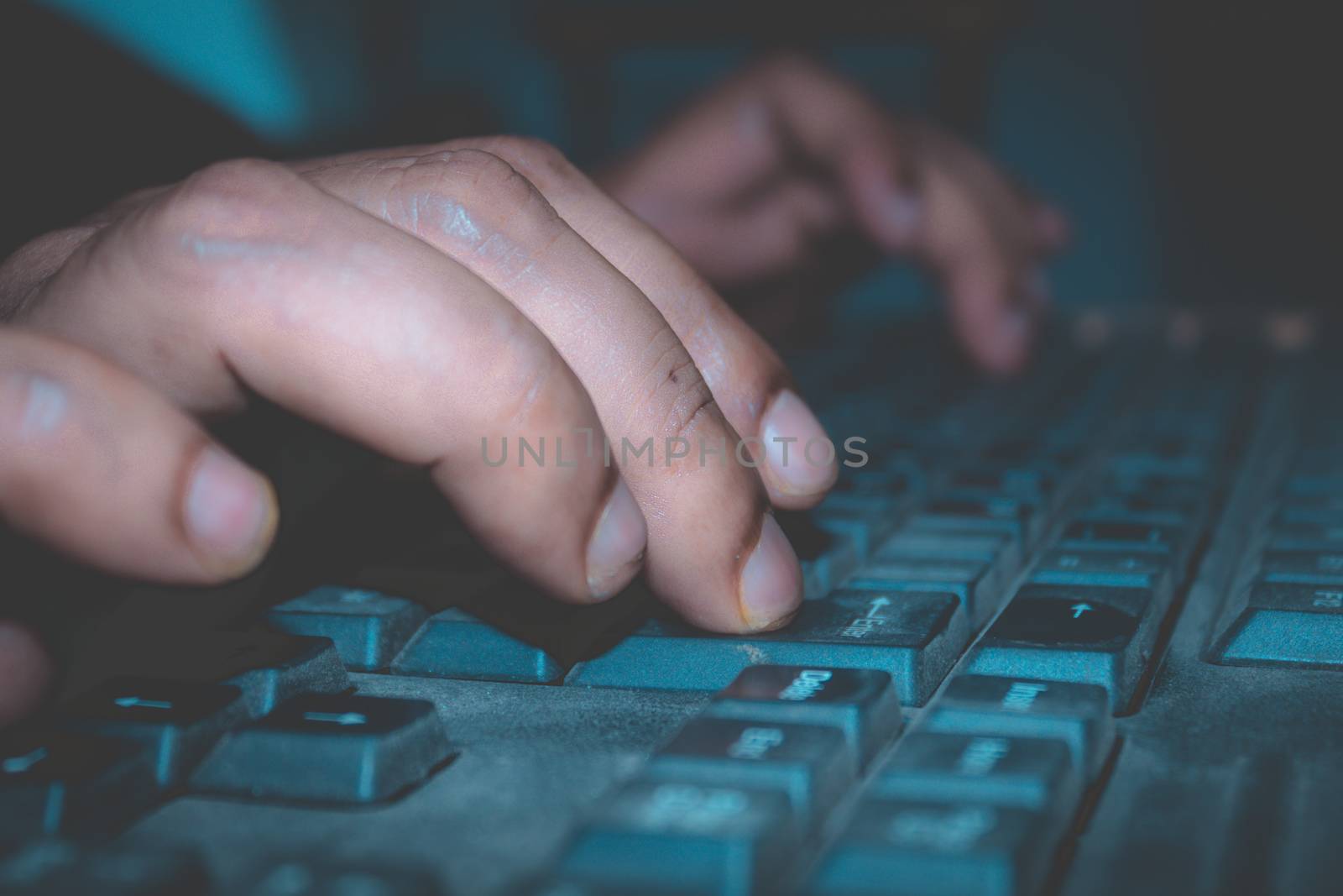 A person using a computer keyboard. by sudiptabhowmick