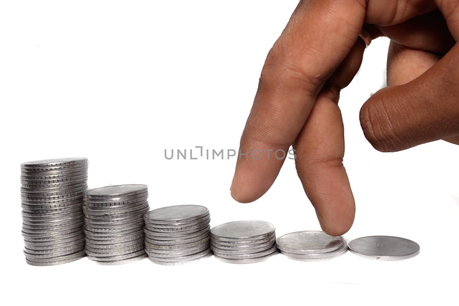 Business man putting fingers on coin and looking for profit growth up, Collecting money with earning bank deposit interest. Business ideas concept isolated white background.
