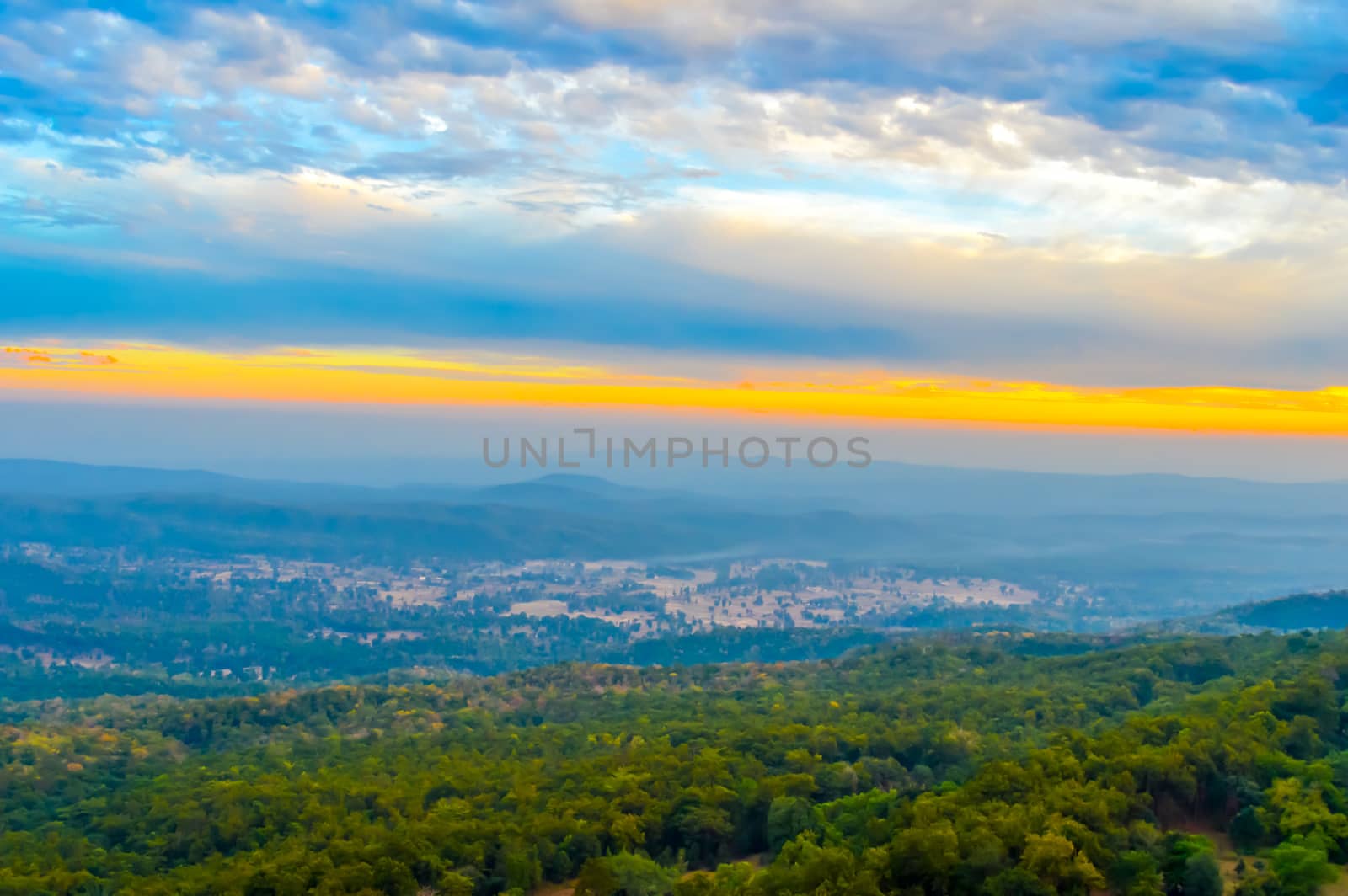 Vibrant color cloud scape on a dramatic sky. Image was captured on a sunny summer day in sunset time. Outdoor travel photography. (Hill station of Darjeeling, West Bengal, India)