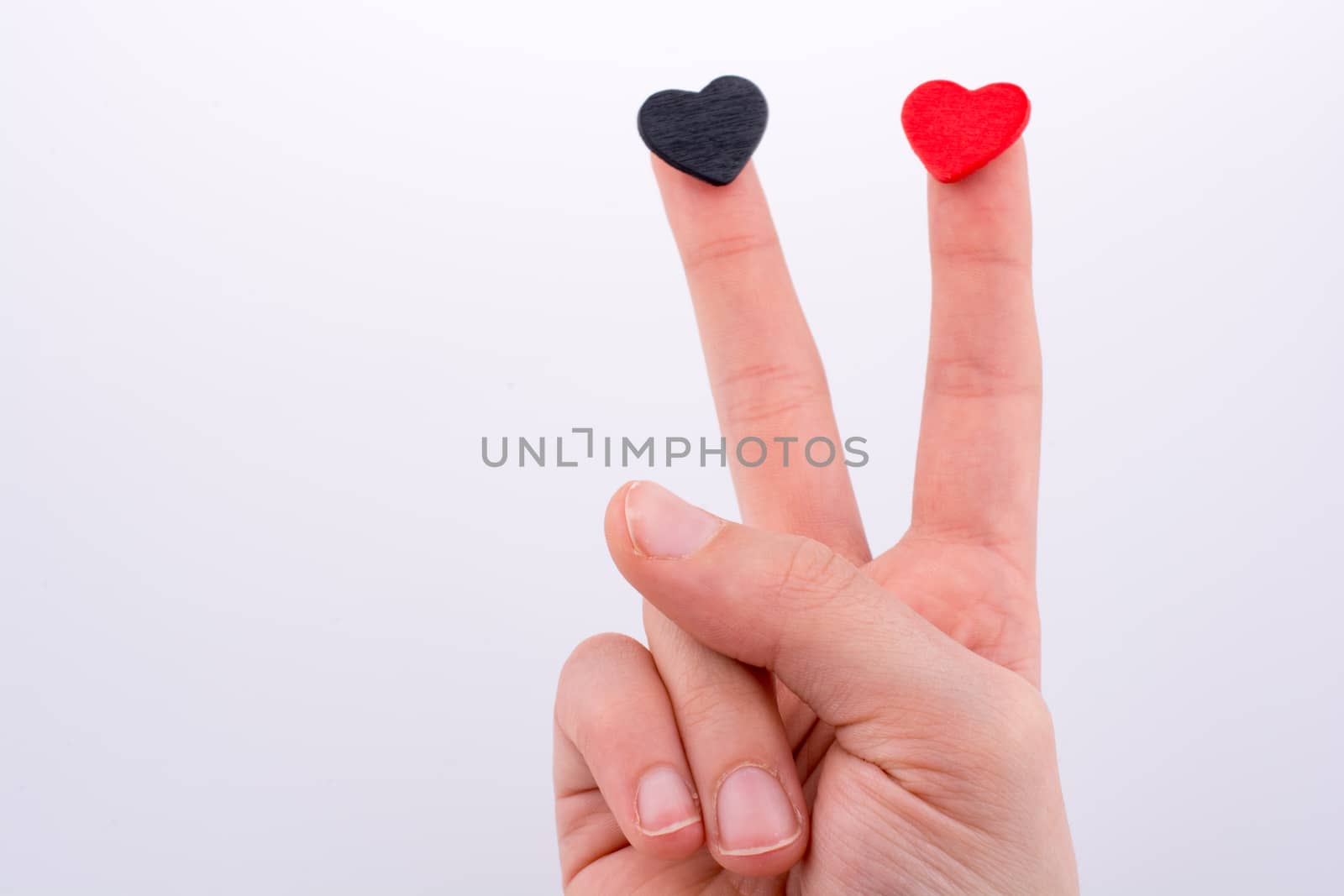 Hand with small hearts on a white background