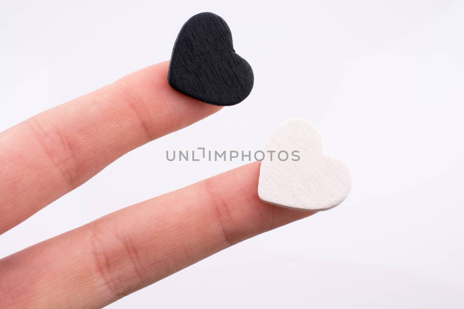 Hand with small hearts on a white background