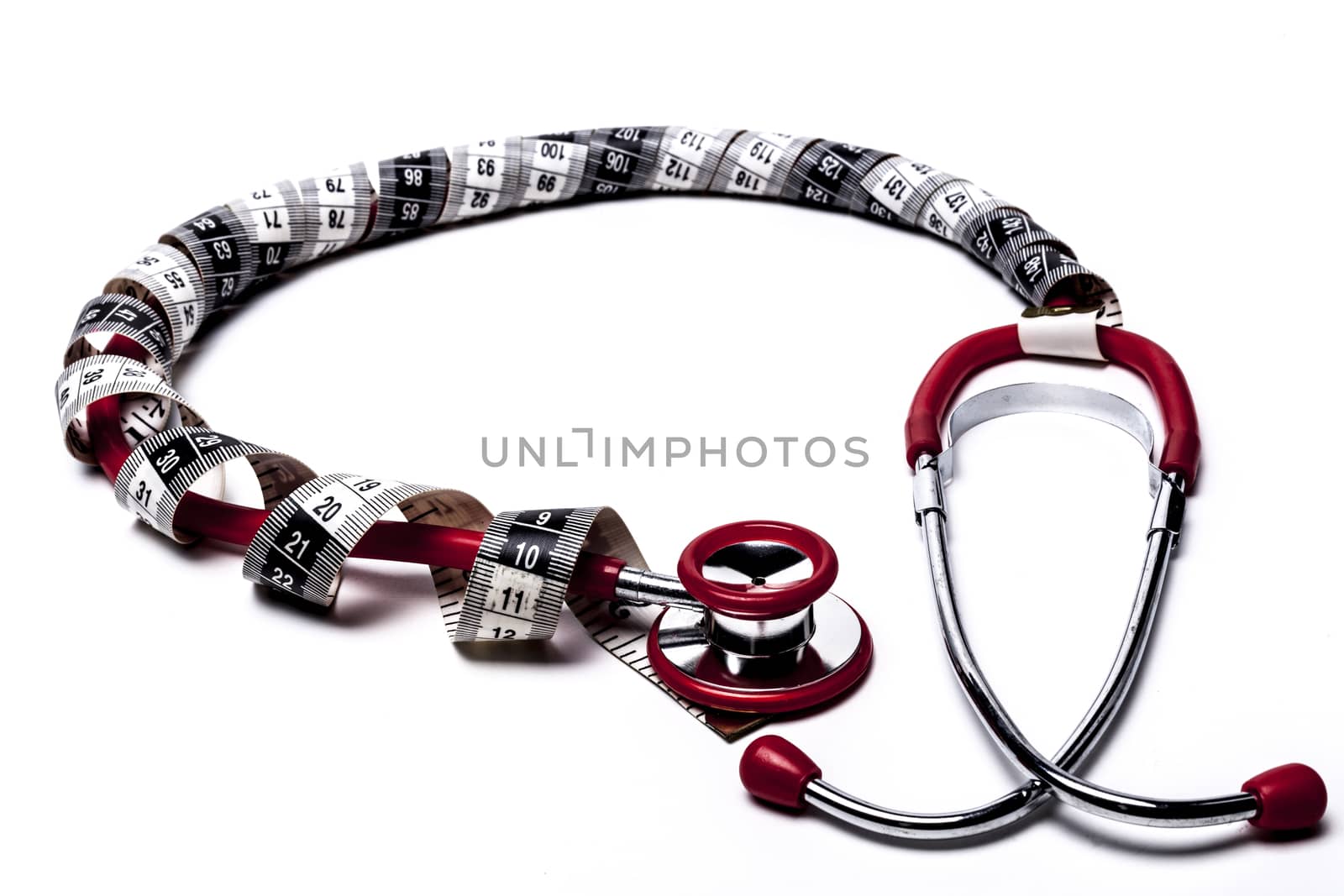 Red Stethoscope With Black Measuring Tape Isolated on White