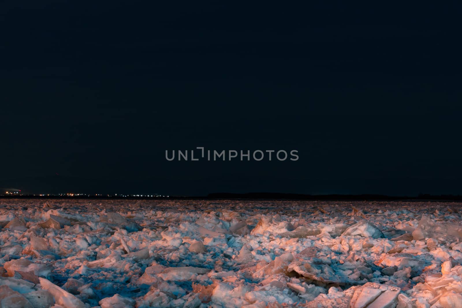 Evening view of the city of Khabarovsk in the winter. The ice on the Amur river.