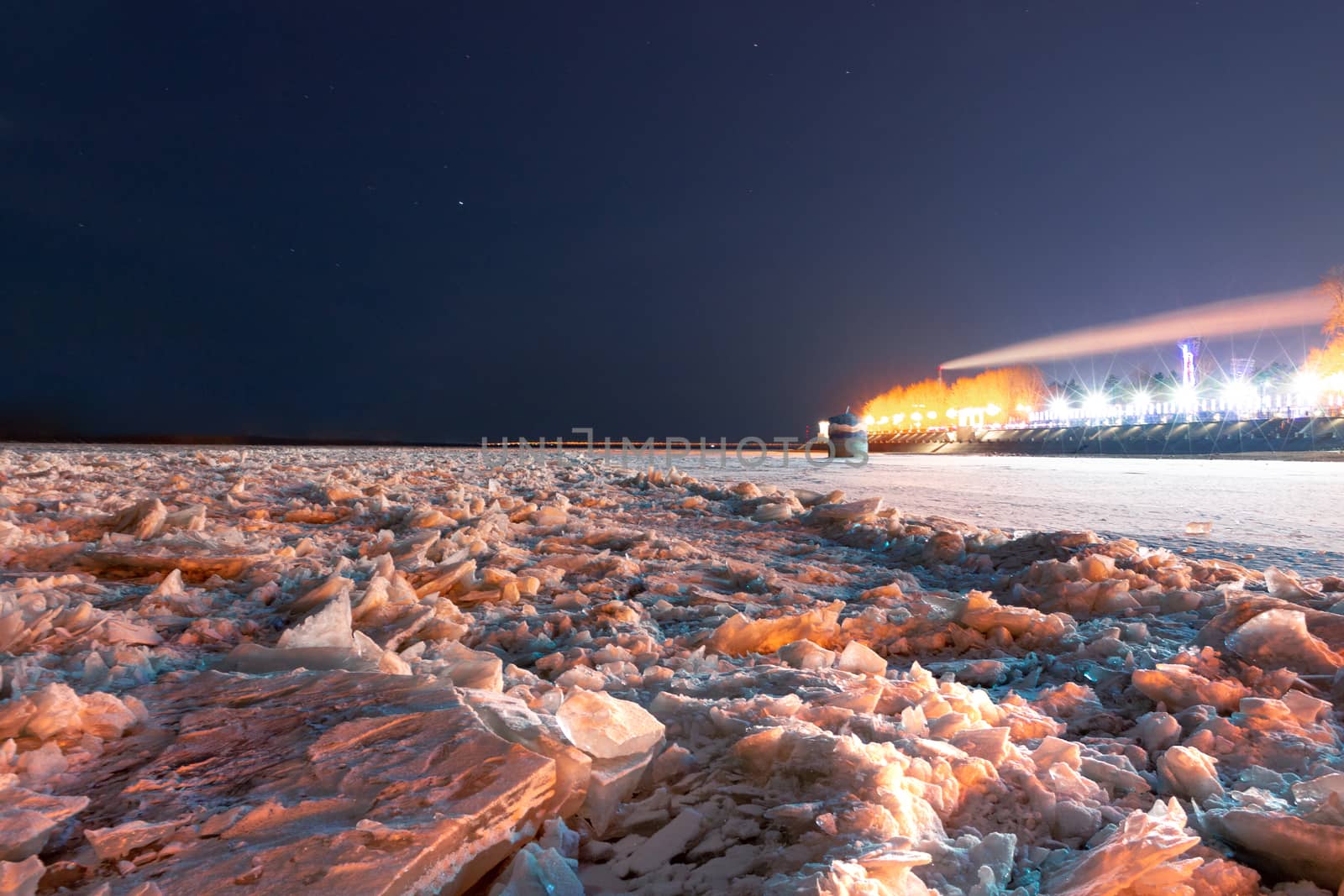 Evening view of the city of Khabarovsk in the winter. The ice on the Amur river.