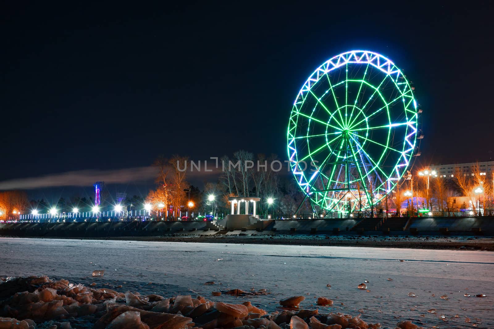 Evening view of the city of Khabarovsk in the winter. The ice on the Amur river.