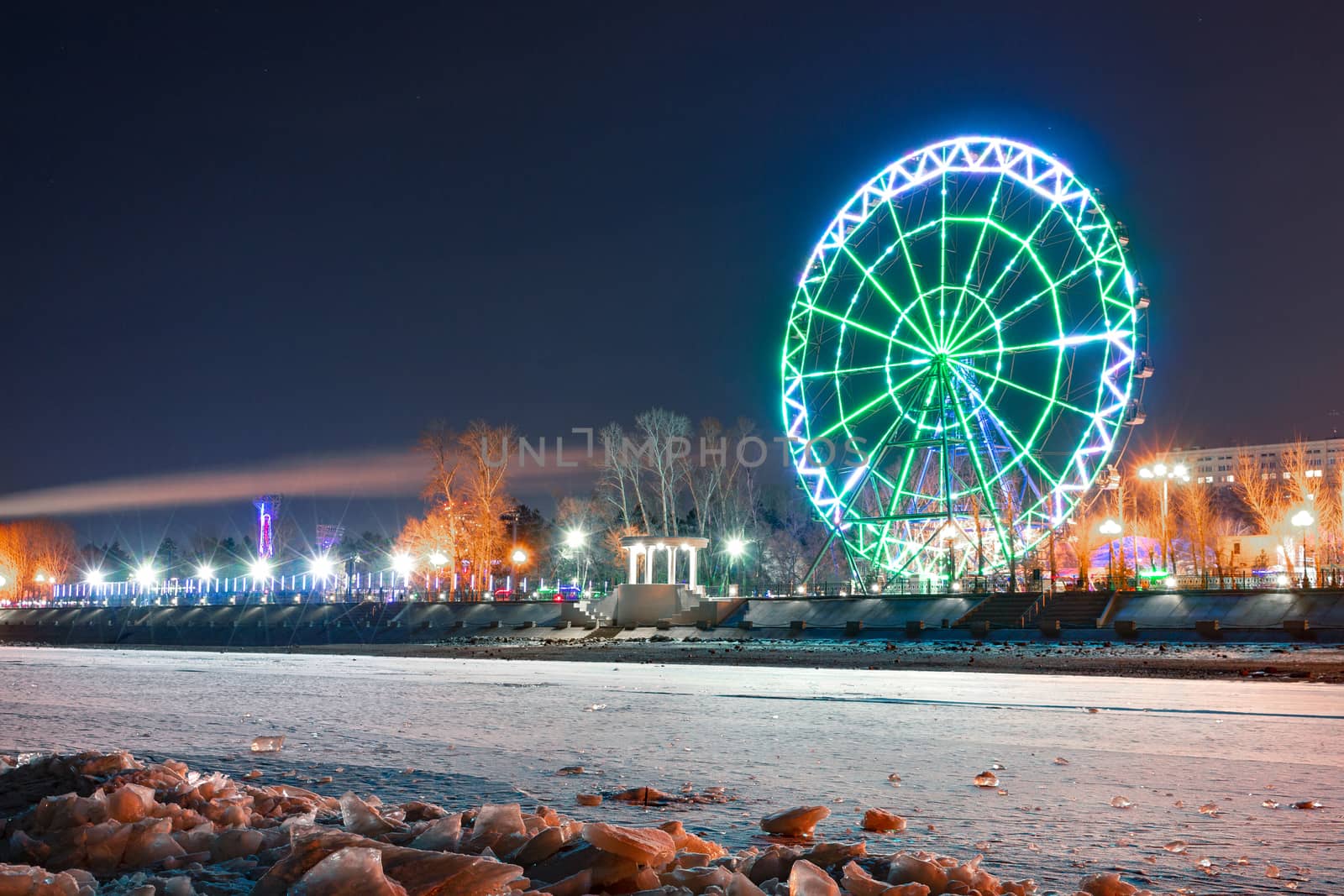 Evening view of the city of Khabarovsk in the winter. The ice on the Amur river.