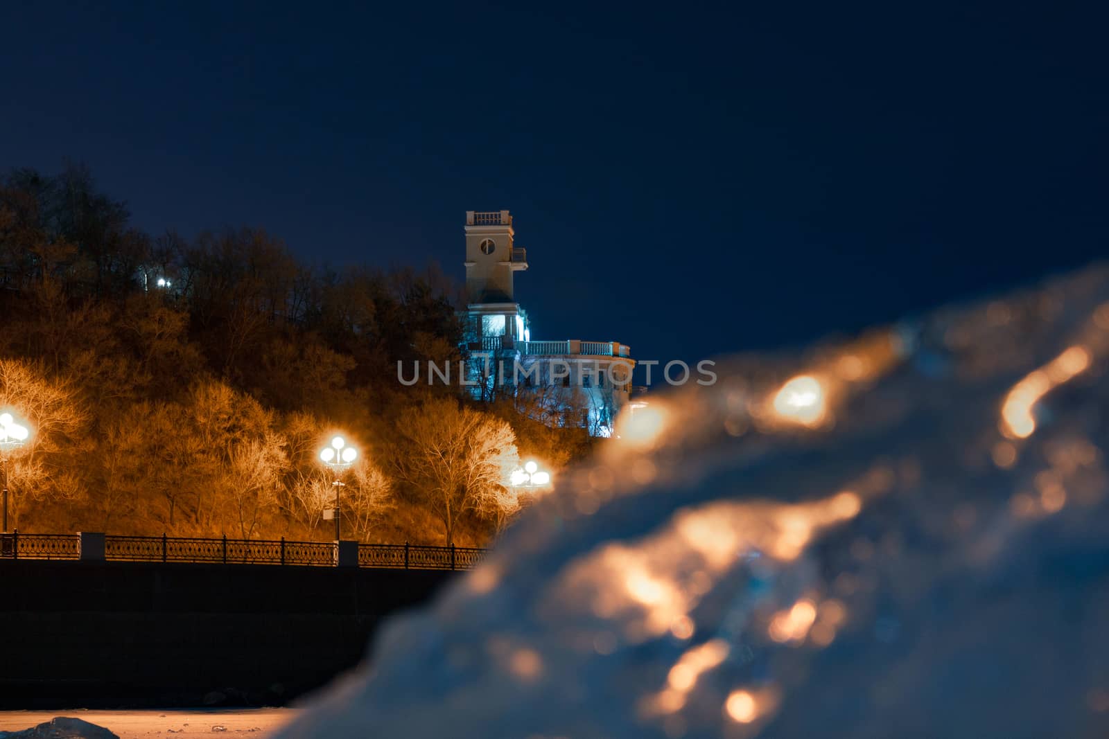 Evening view of the city of Khabarovsk in the winter. The ice on the Amur river.