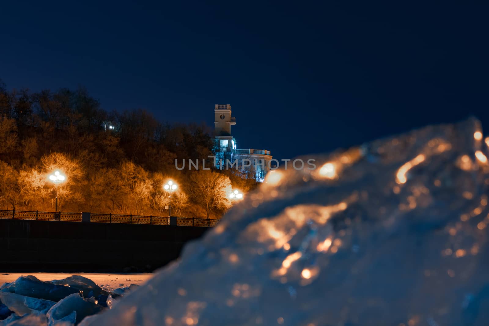 Evening view of the city of Khabarovsk in the winter. The ice on the Amur river.