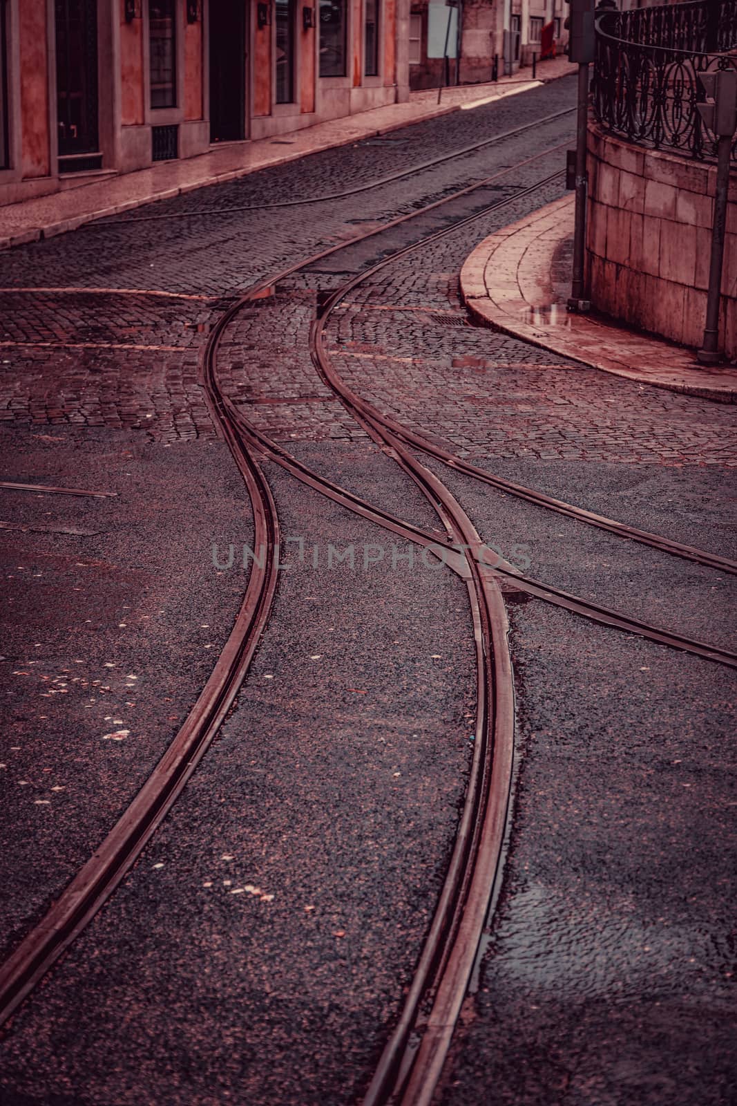 Tram tracks on a street in Lisbon, detail of a route for public transport in the city