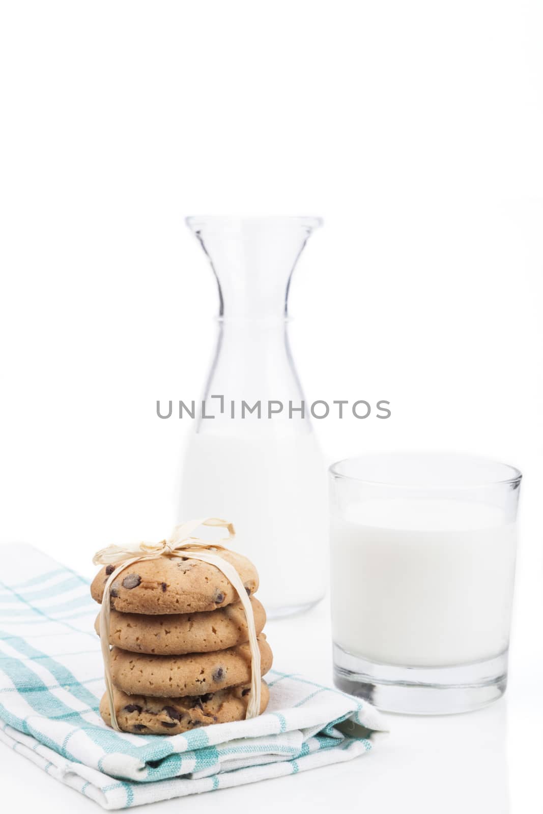 Glass of milk and chocolate chips cookies