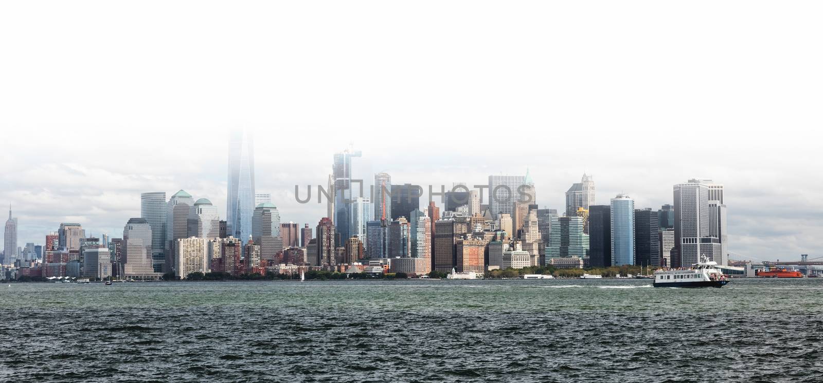 New York City skyline in fog w the Freedom tower