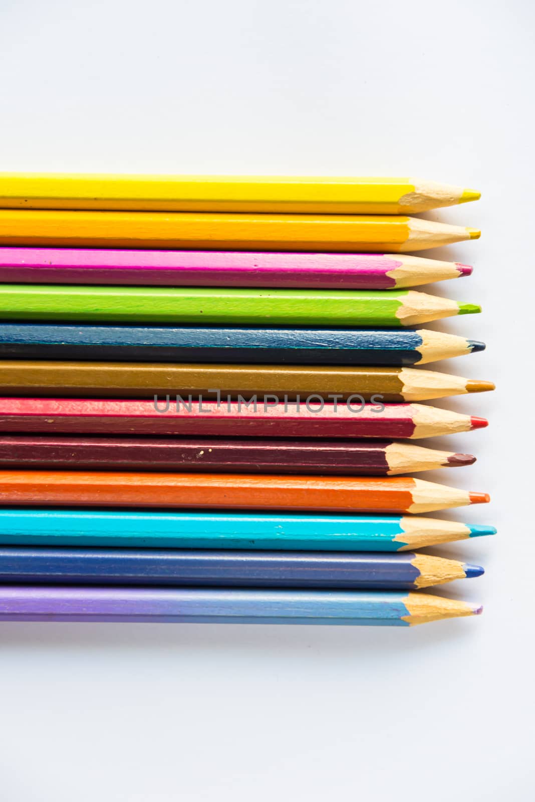 Colour pencils on white background, isolated