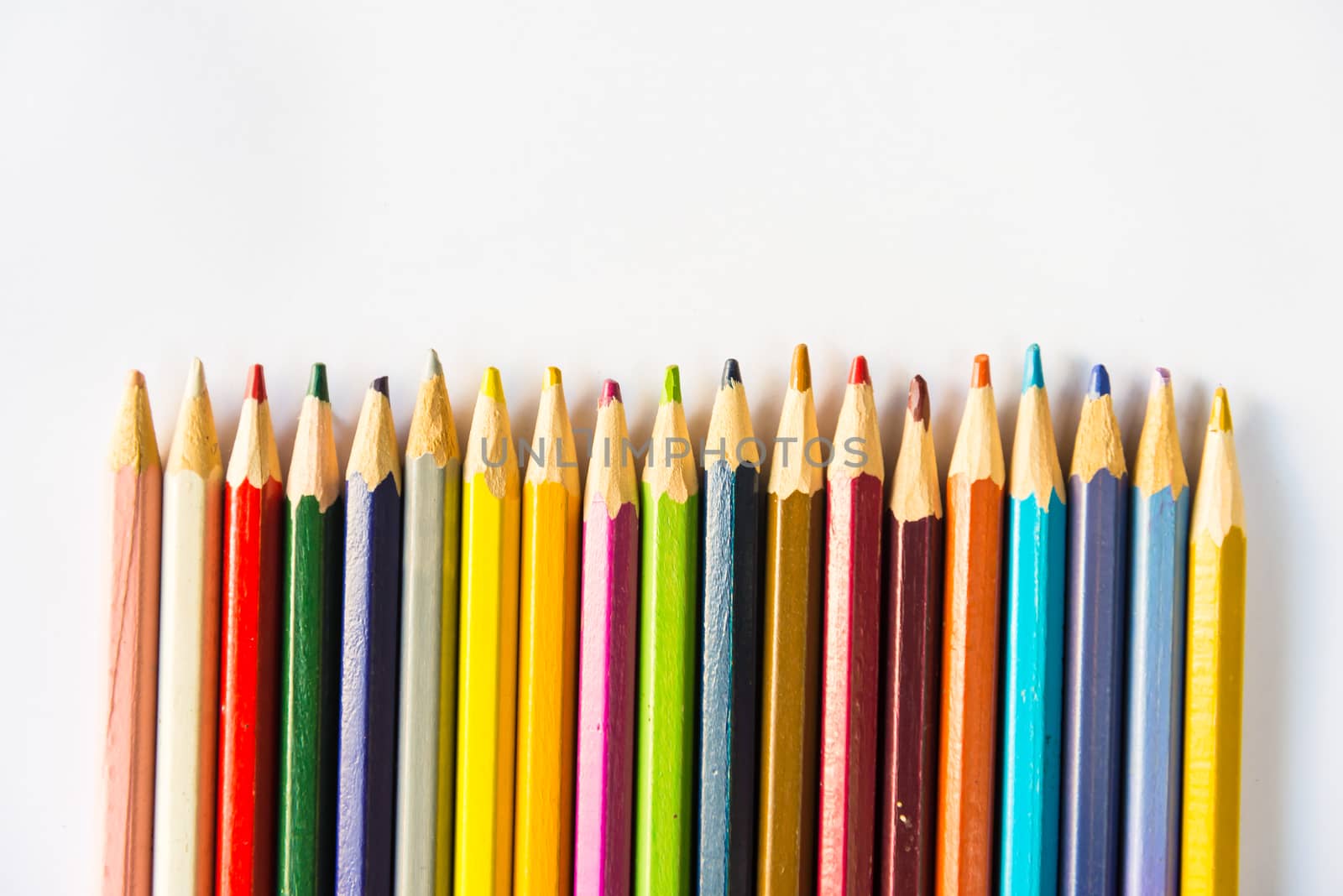 Colour pencils on white background, isolated