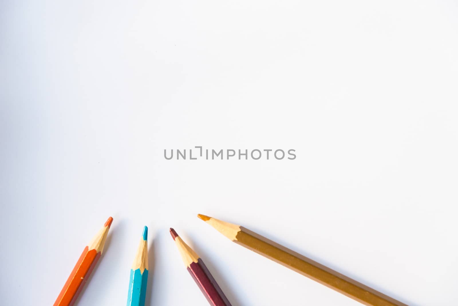 Colour pencils on white background, isolated