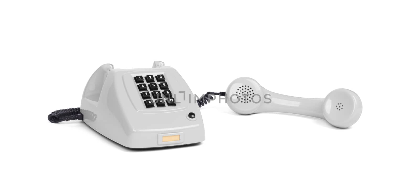 Vintage grey telephone with a white background