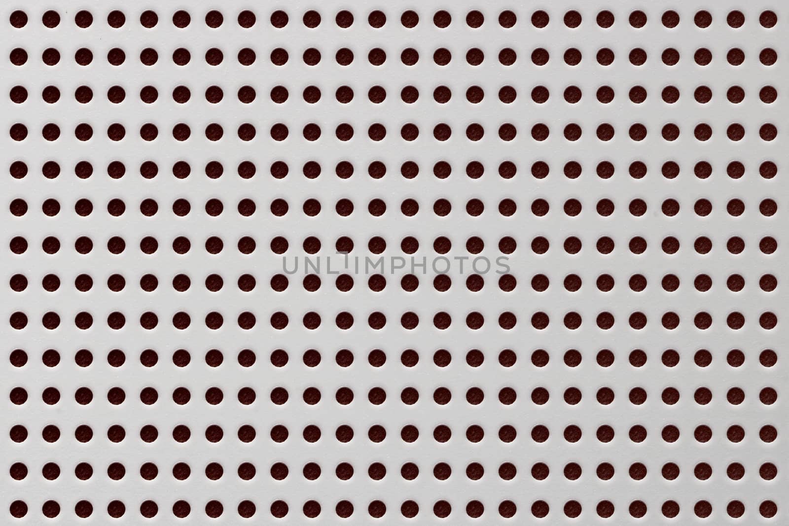 Texture of cutting hole white plastic or drilling holes on canvas, abstract pattern background