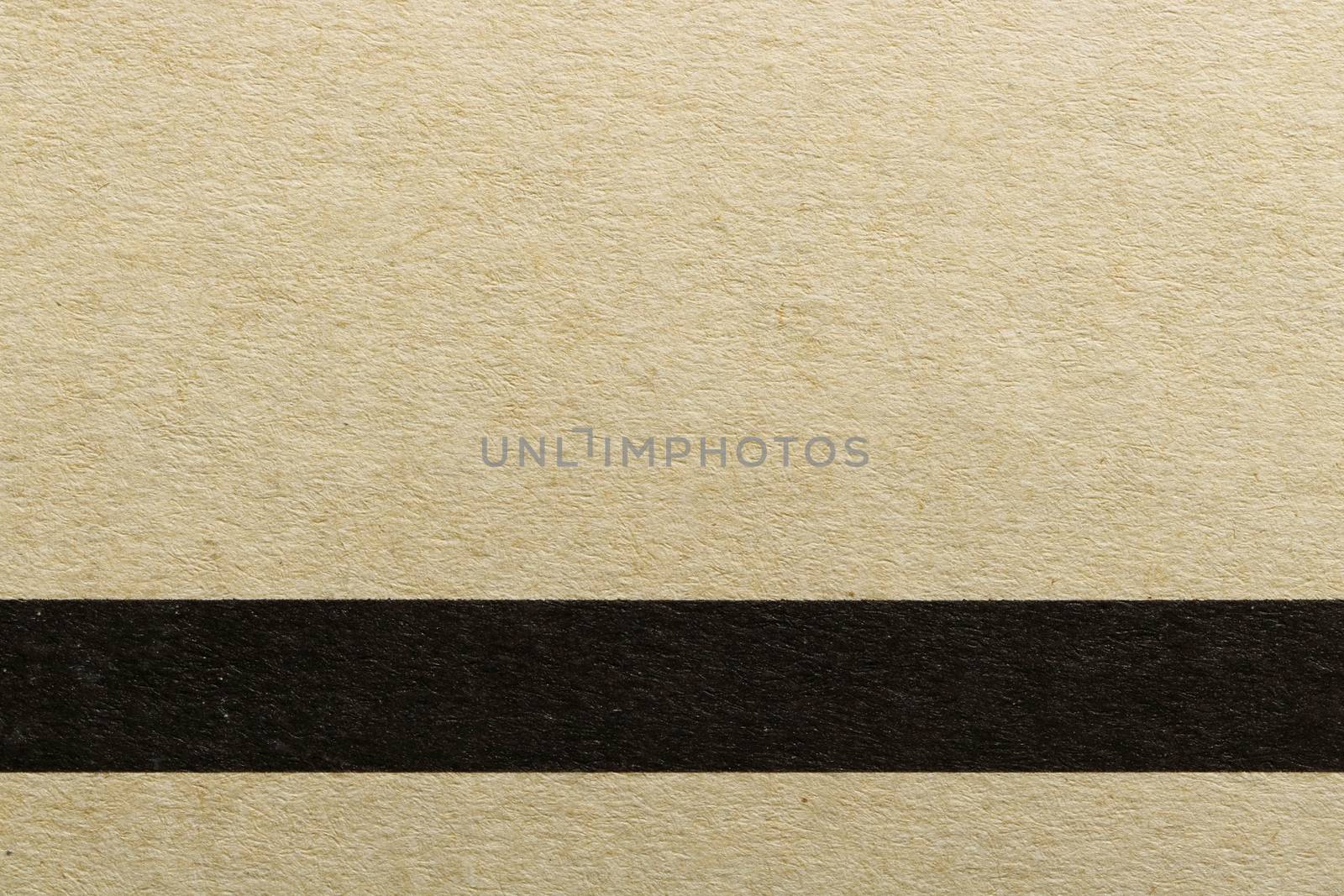 Texture of horizontal black line on brown cover paper, abstract pattern background