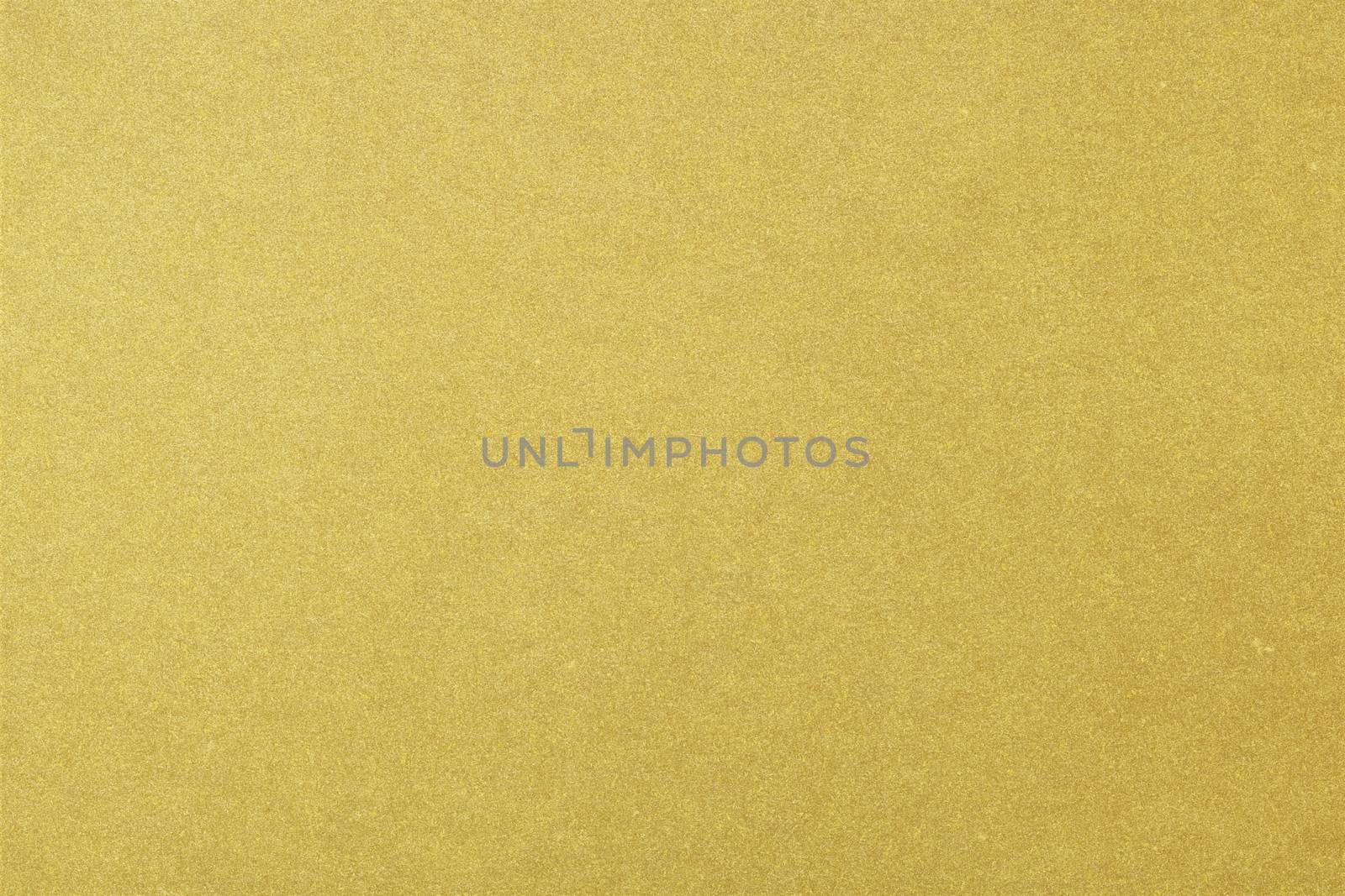 Texture of rough gold recycle paper sheet, abstract background