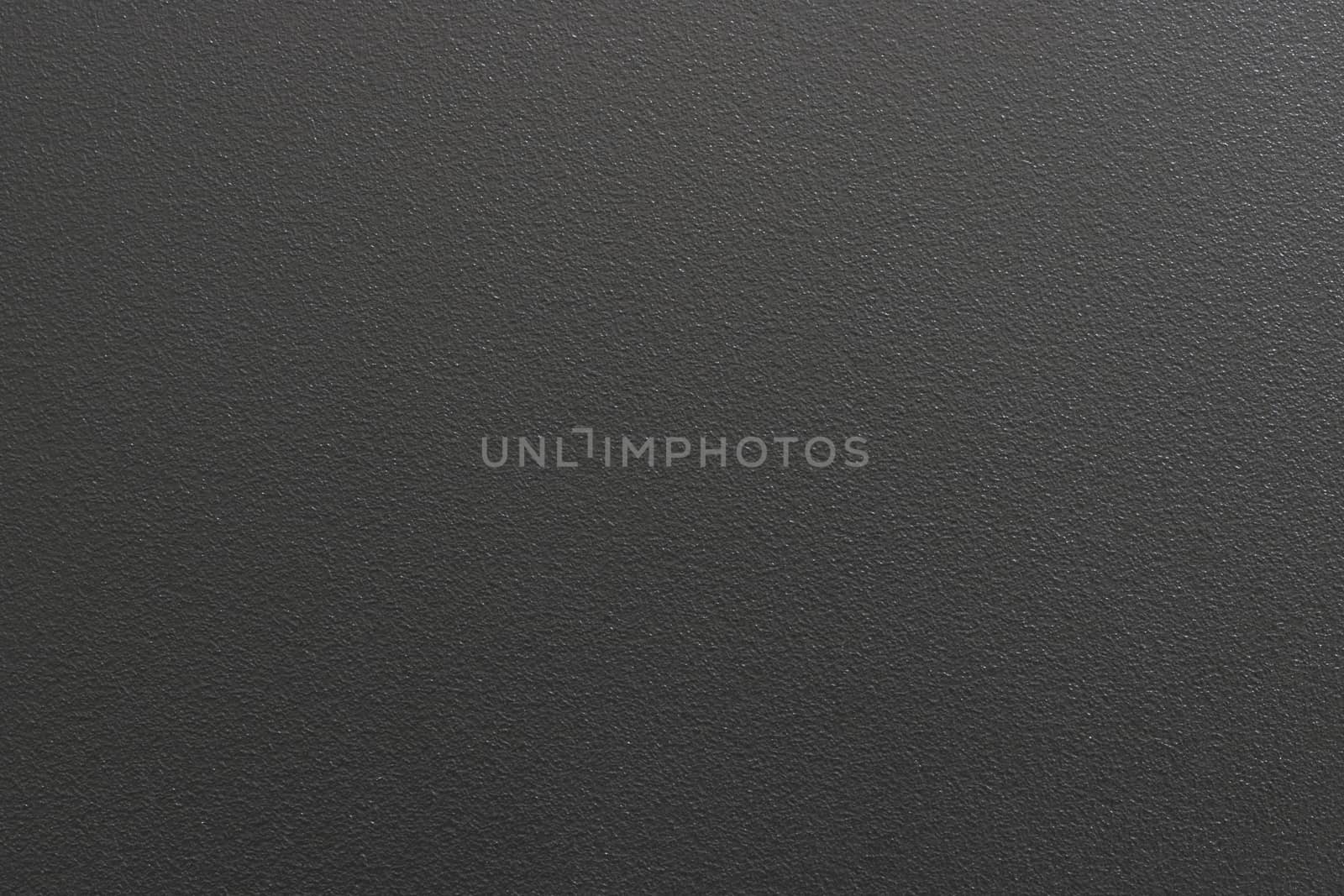 Texture of spray black paint on metallic plate, abstract pattern background