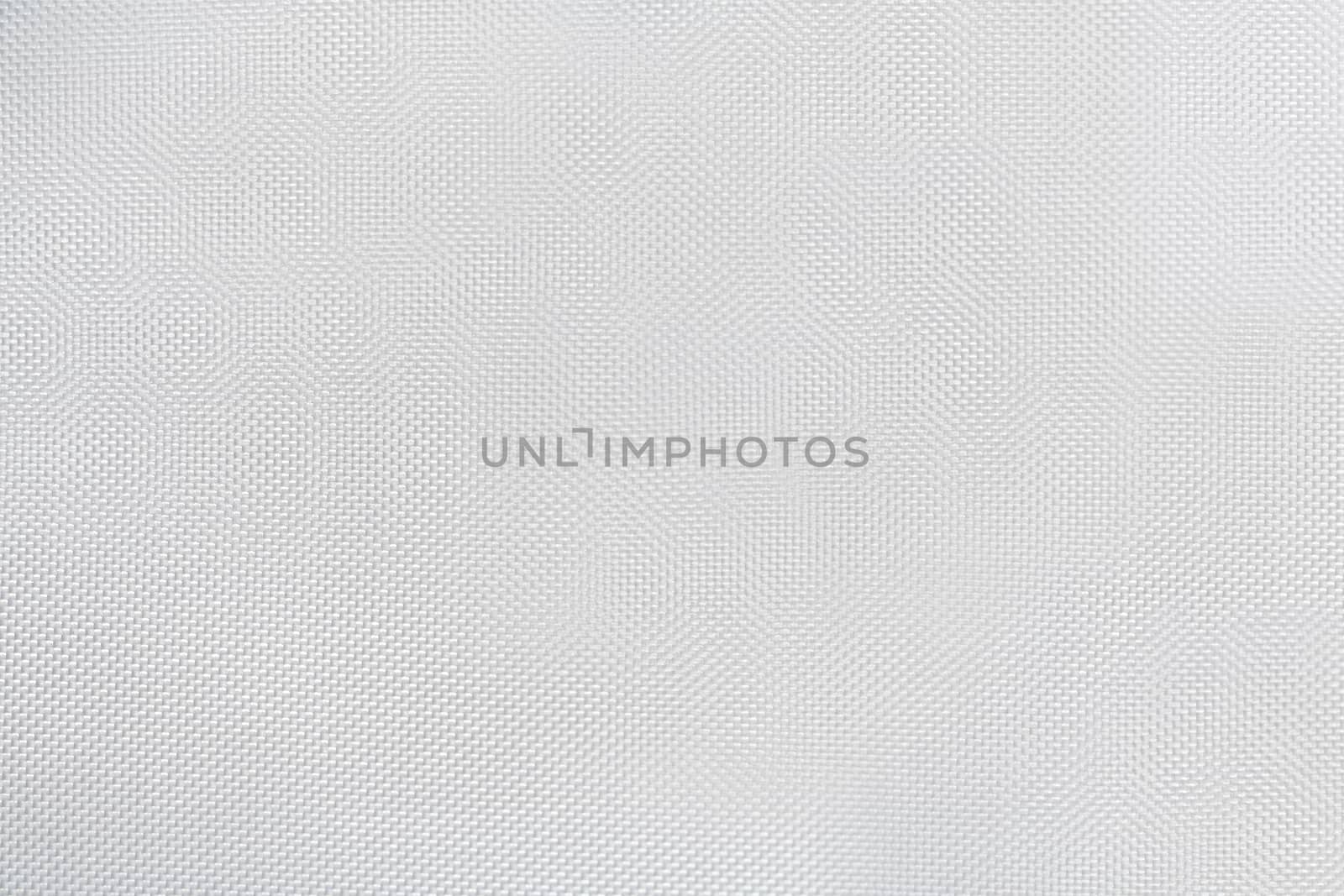 Texture of white canvas with material flake small pieces, abstract pattern background