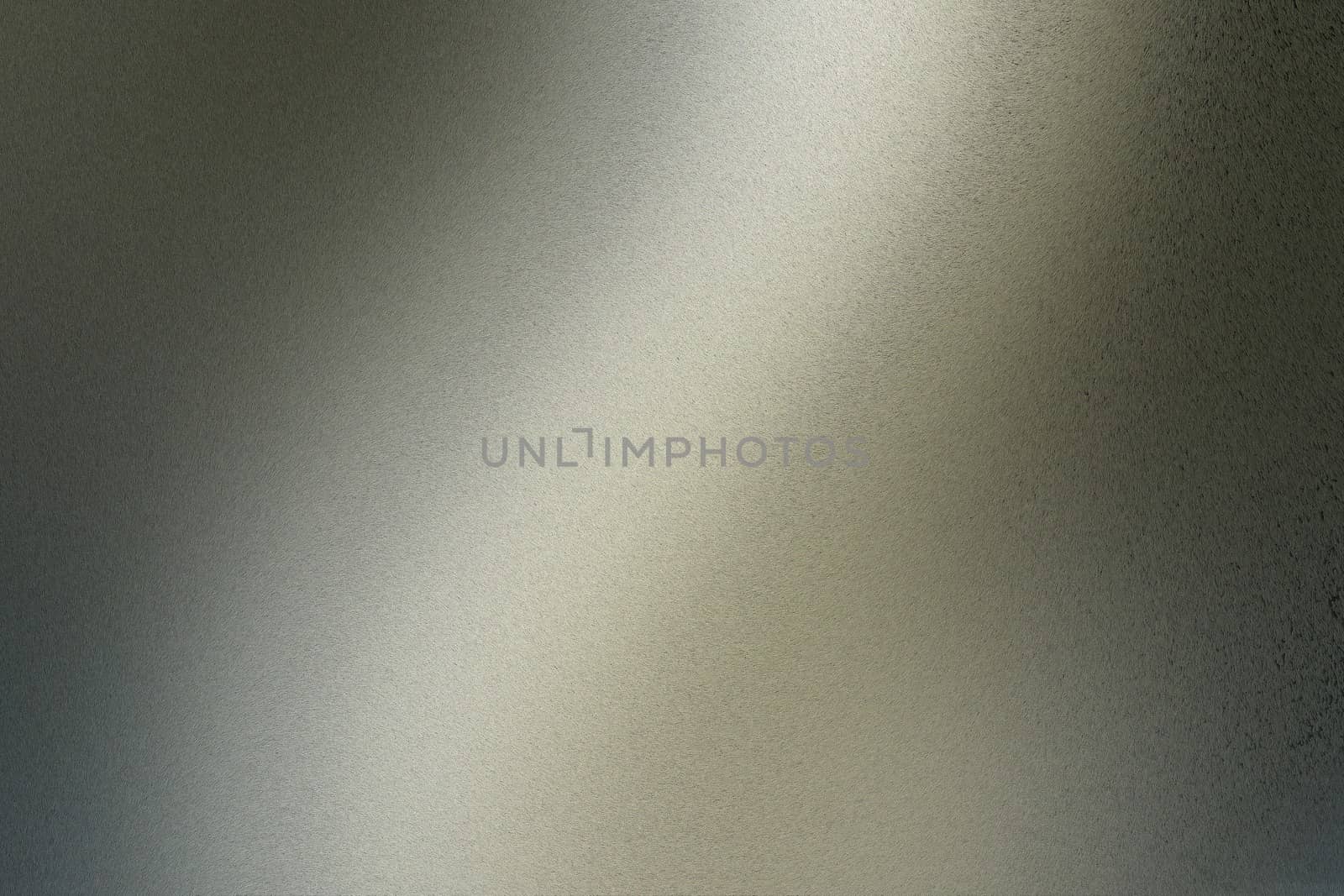Texture of brushed dark green steel with light reflection, abstract background
