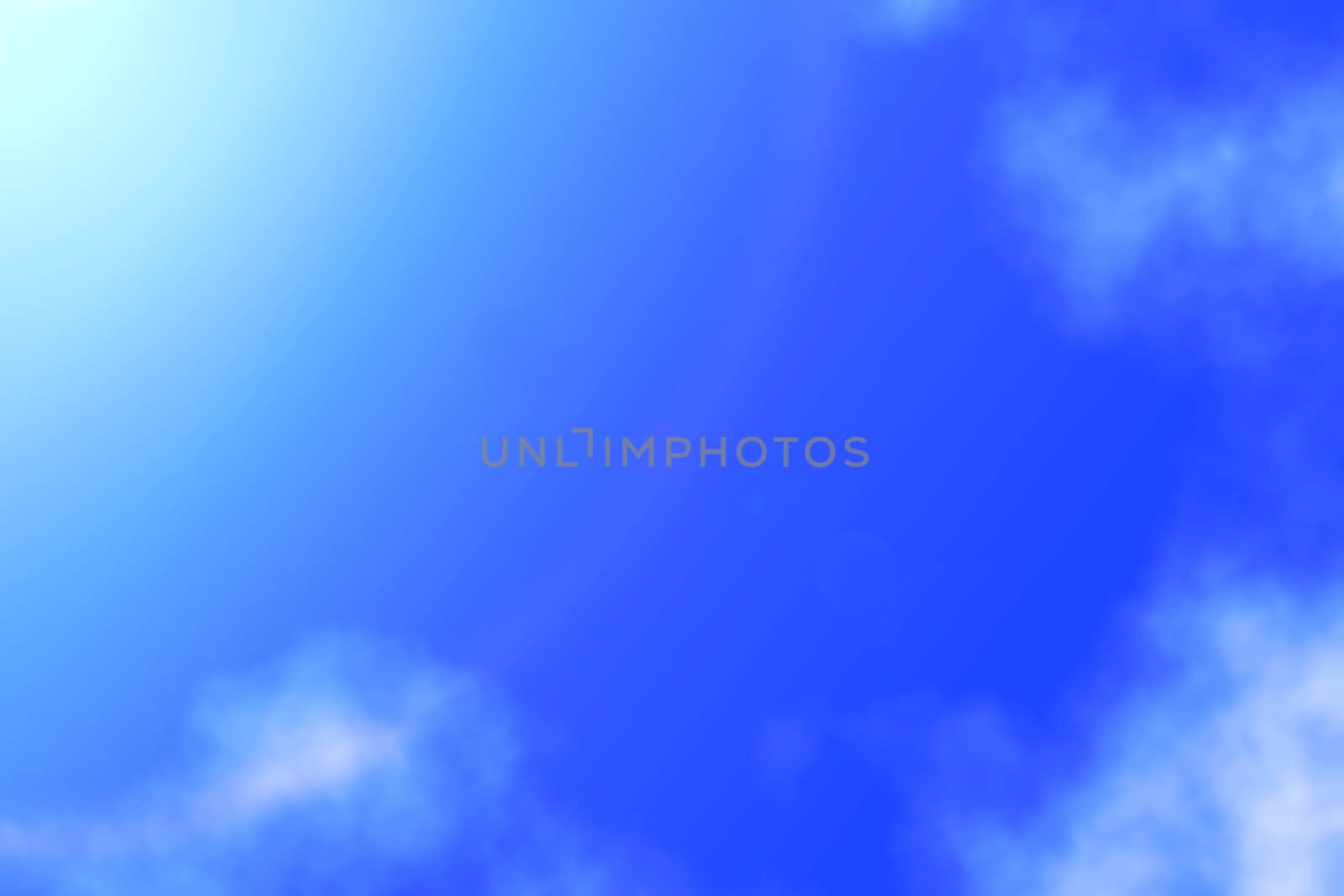 Sun shines on blue sky amid cloud ,abstract background by mouu007