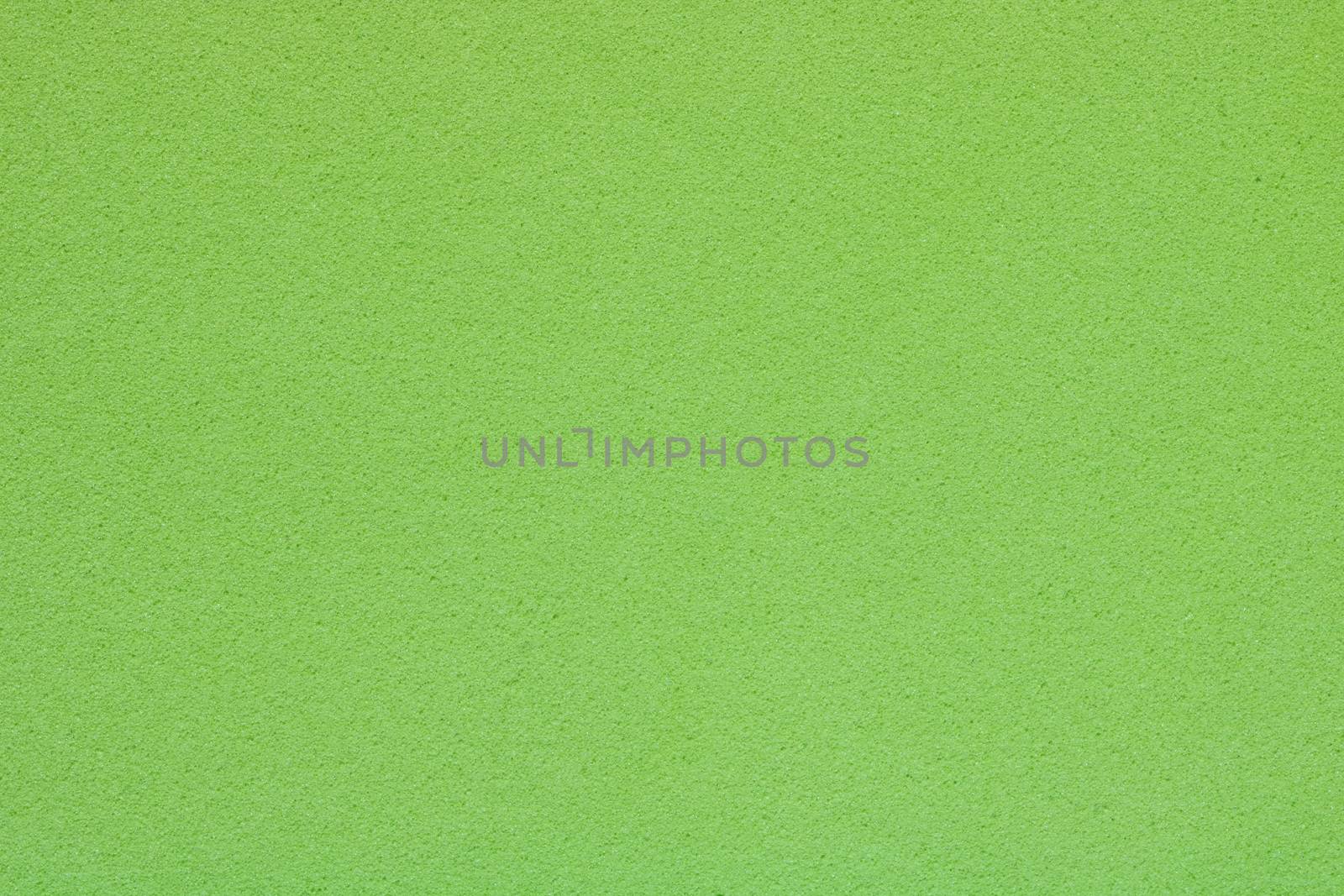 Texture of light green sponge, abstract background