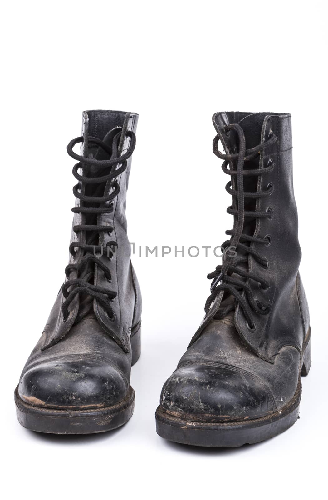 Black Dirty army boots isolated on white background