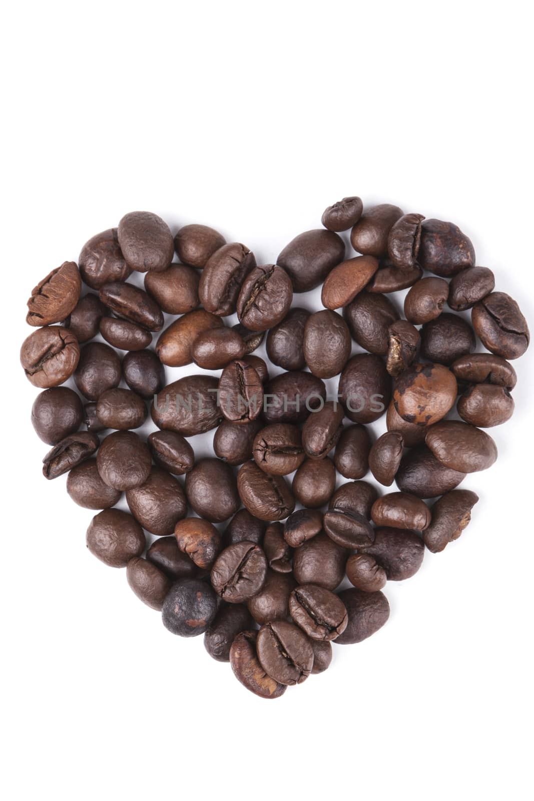 Heart shape coffee beans isolated on white background