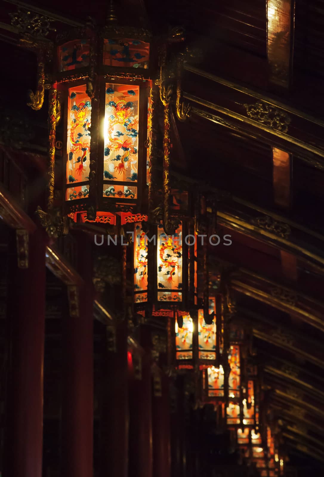 Glowing decorative Chinese lanterns, hanging from the ceiling