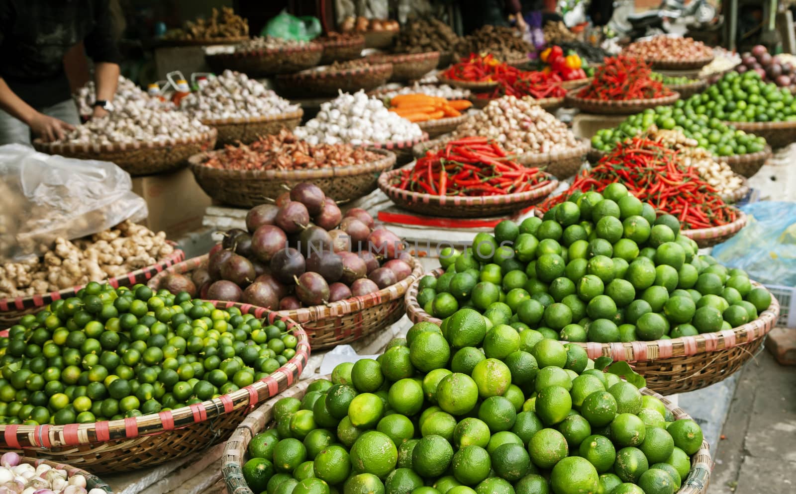 Fruits and spices at a market in Vietnam by Goodday