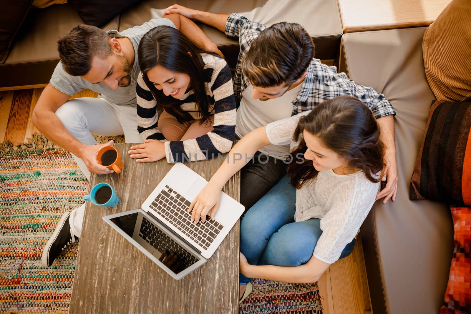 Group of friends studying in the local coffee shop