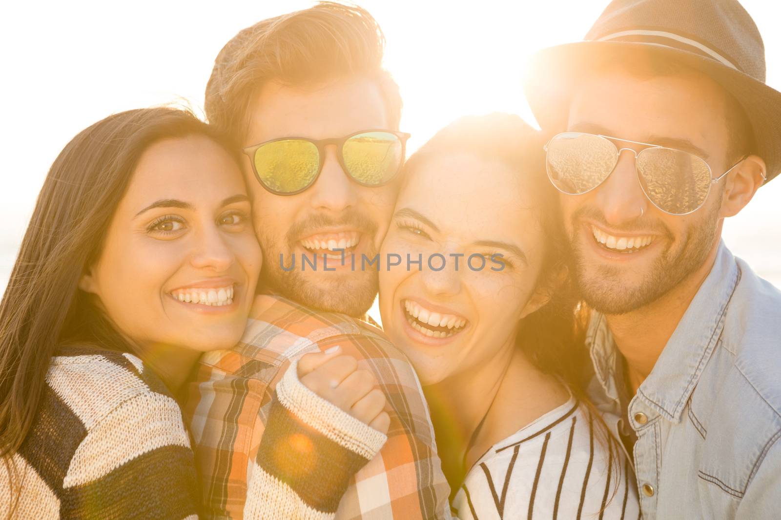 Friends at the beach enjoying the summer