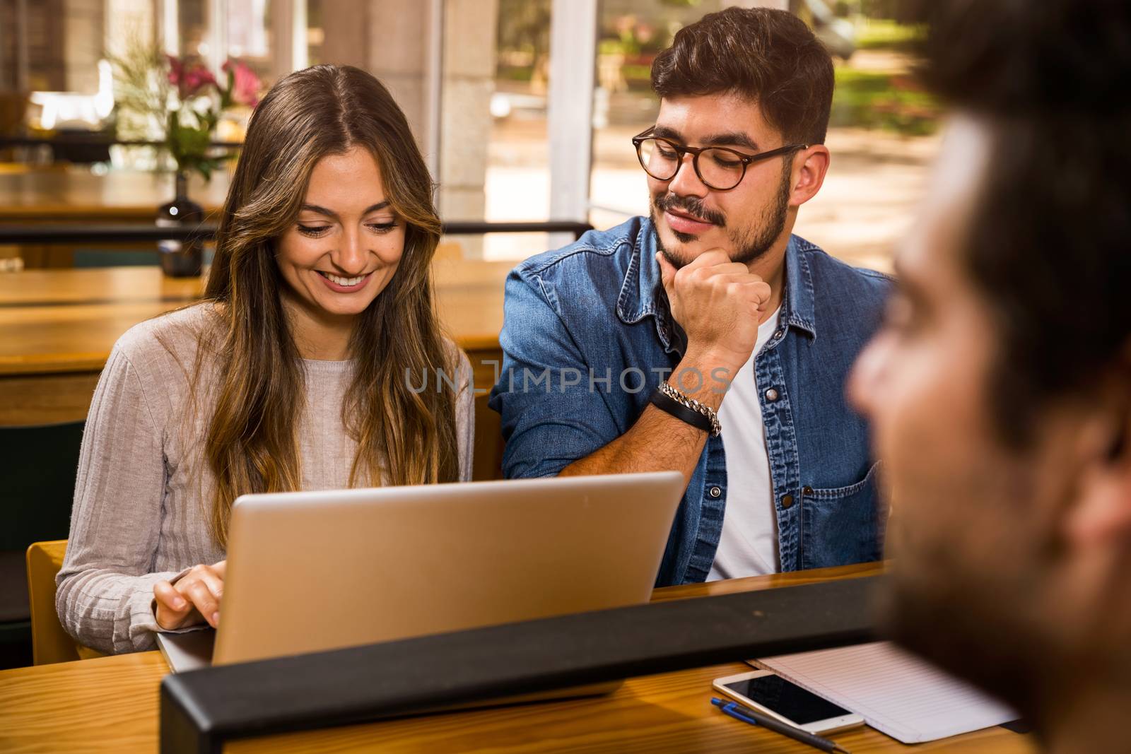 Group of young people studying together for the upcoming exams