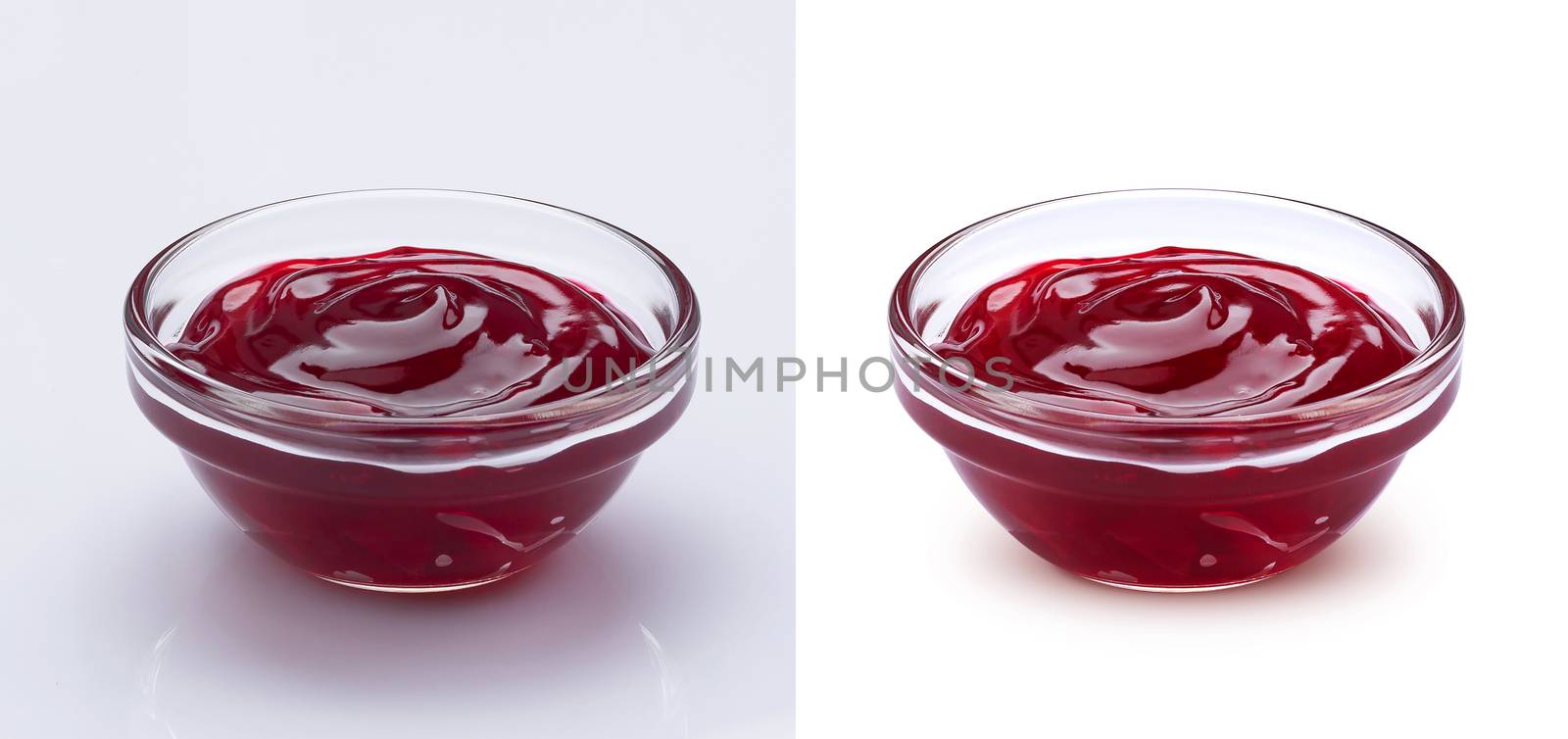 Small glass bowl of red berry jam isolated on white background, sweet cherry jam