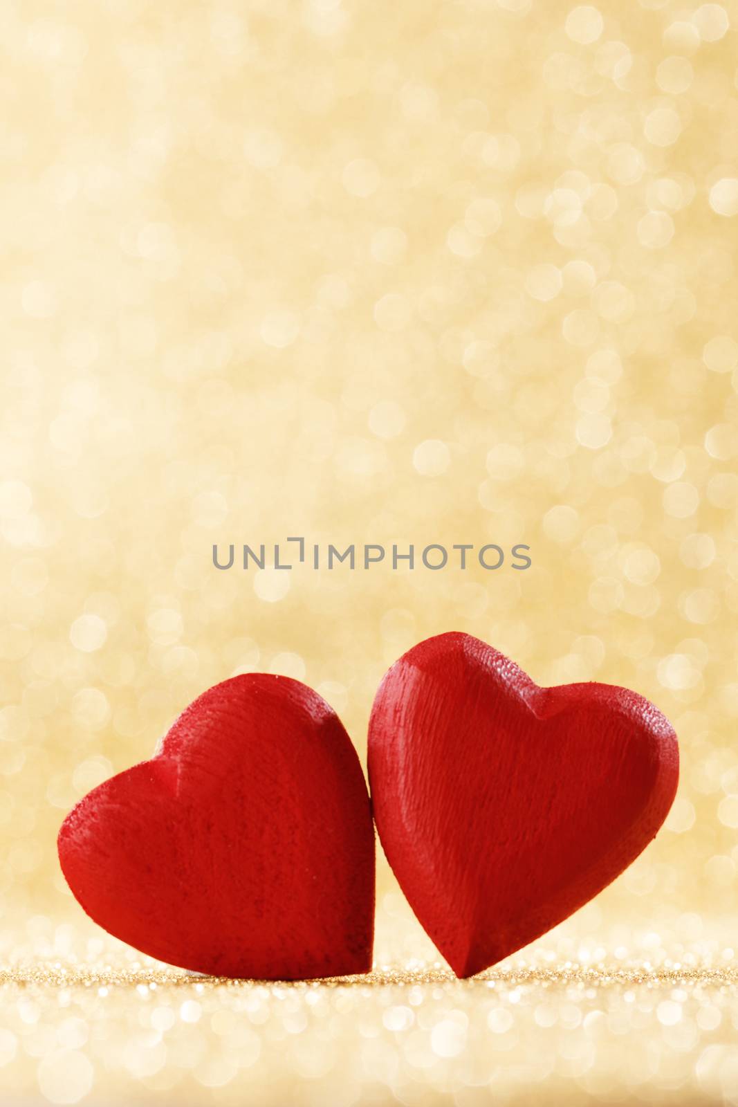 Red hearts on glitter background by Yellowj