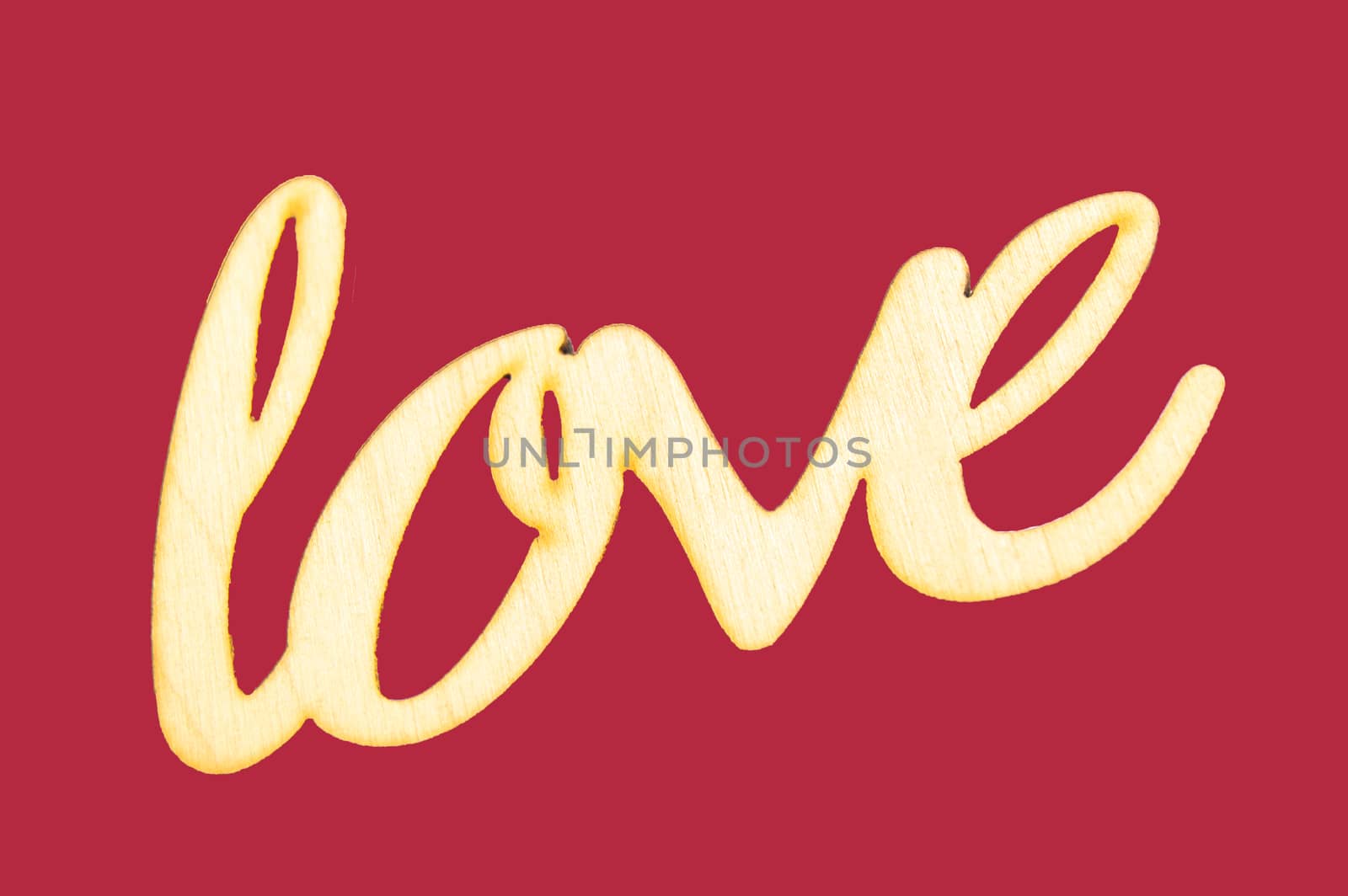 Wooden word love on red isolated background by claire_lucia