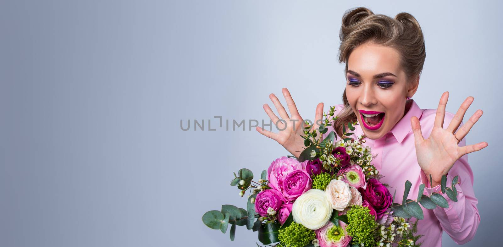 Woman surprised with bunch of flowers, funny emotional expression