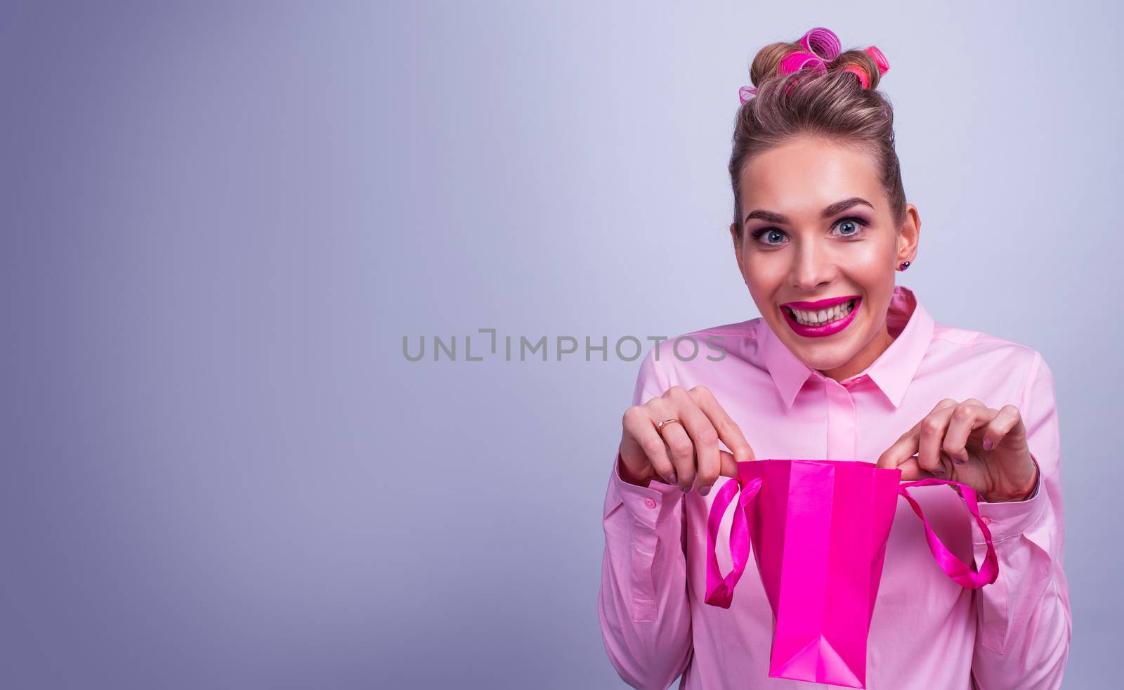 Woman with small shopping bag by ALotOfPeople