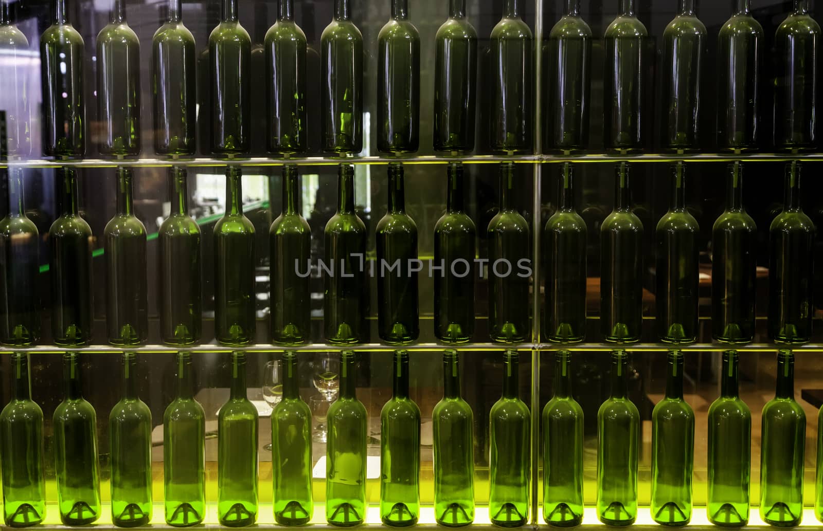 Empty wine bottles, detail of decorative glass bottle