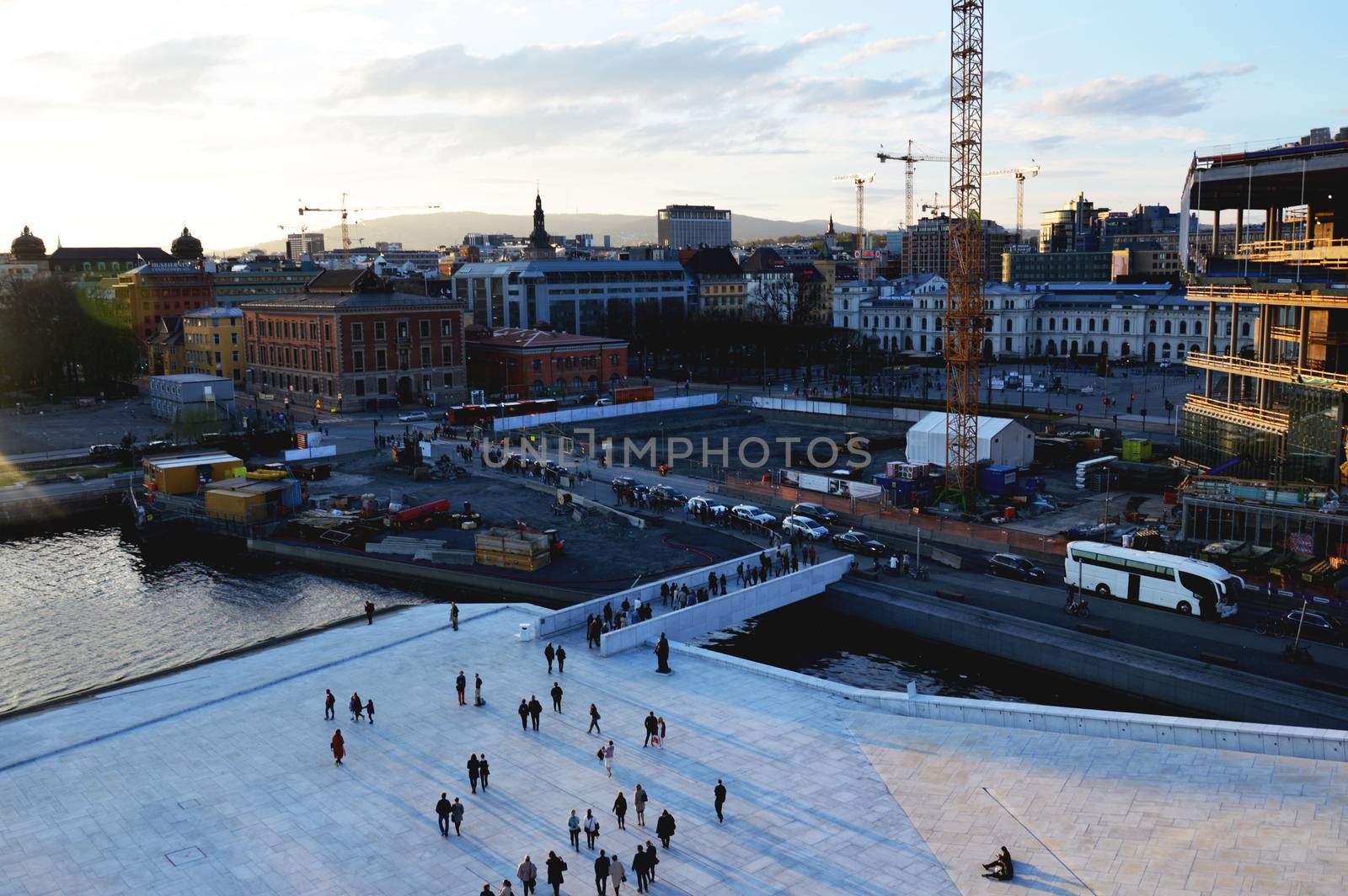 OSLO, NORWAY. Tourists and locals walk in the Oslo city center streets in spring time