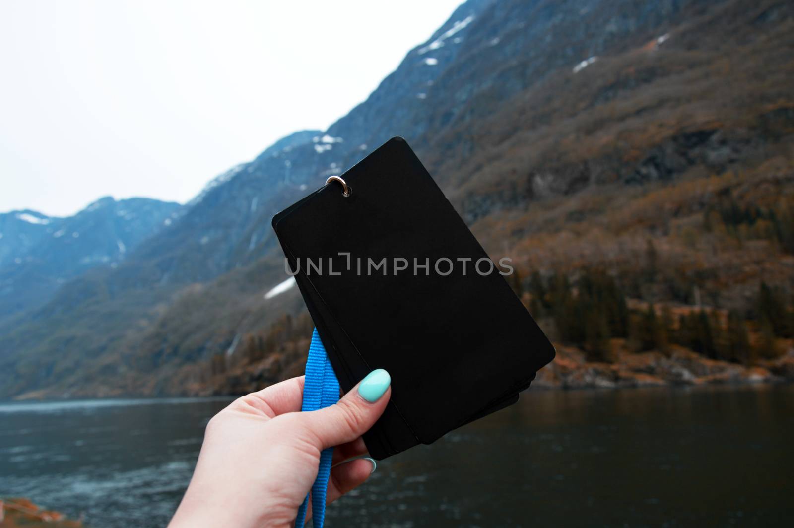 Badge blank in black against the background of the Norwegian mountains by natali_brill