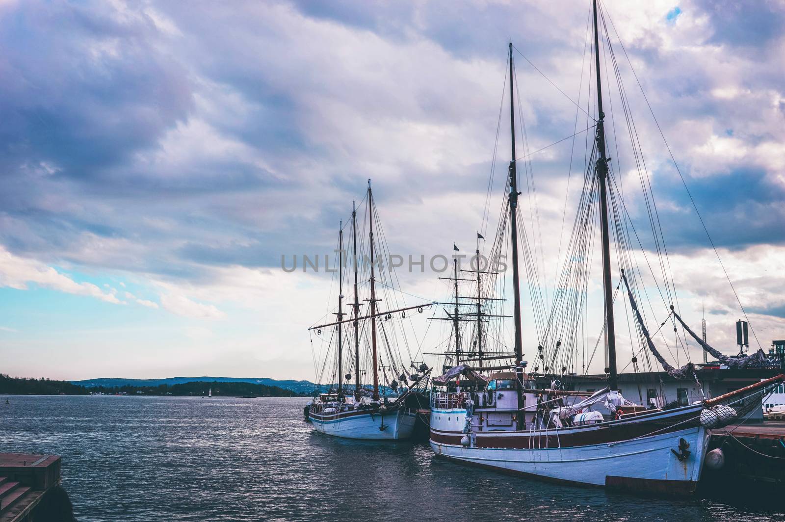 Picture of sailboats reflected in water, yacht port on the bay, water transport, ocean transportation, beautiful vessel in the harbor, summer vacation, active lifestyle, holiday concept. Stockholm