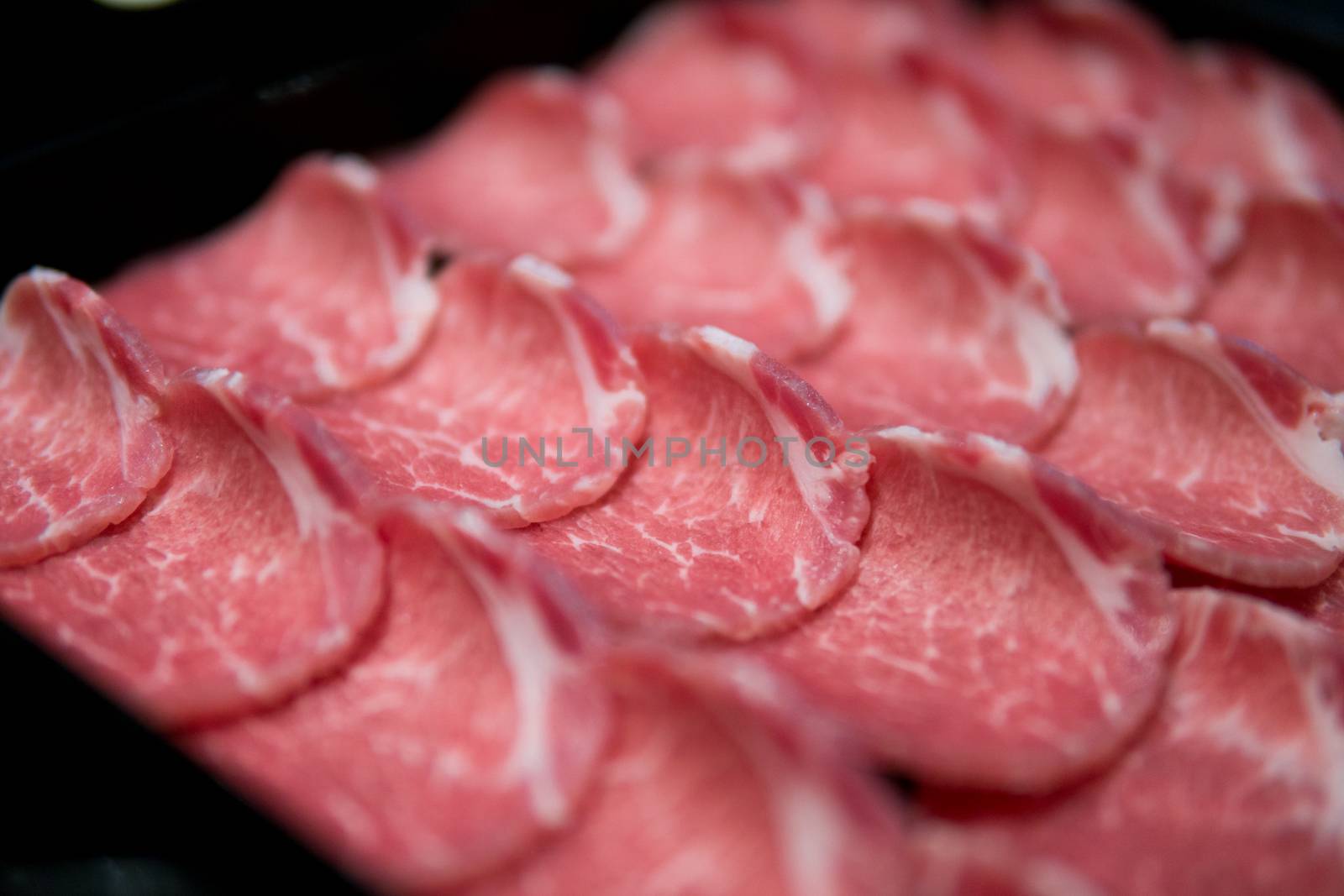 slim slices of raw meat by antpkr