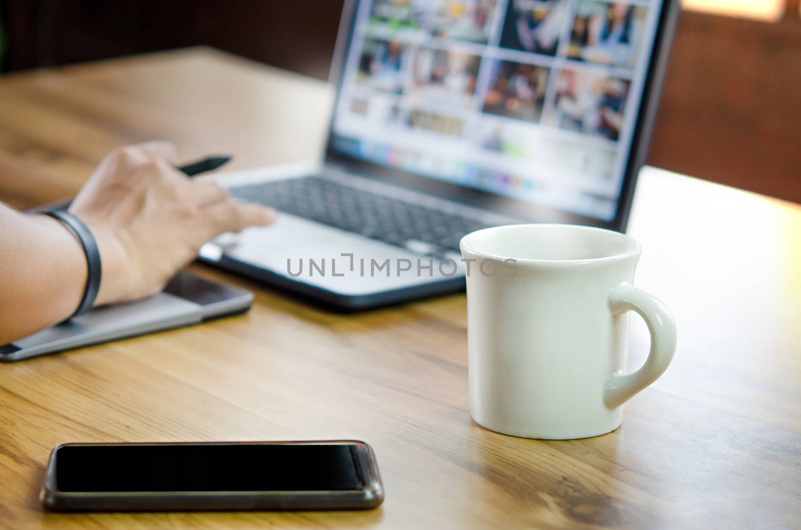 businessman using laptop computer  in office. hipster tone