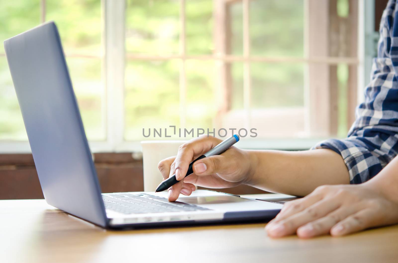 businesswoman using laptop computer  in office. hipster tone