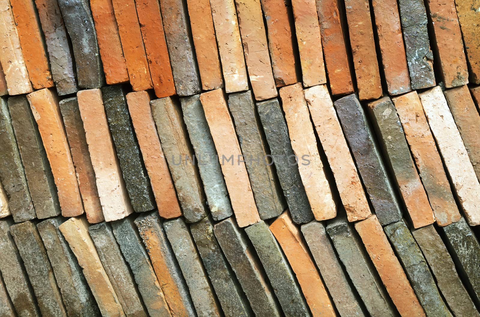 Background of old clay tiles in a pile by Goodday