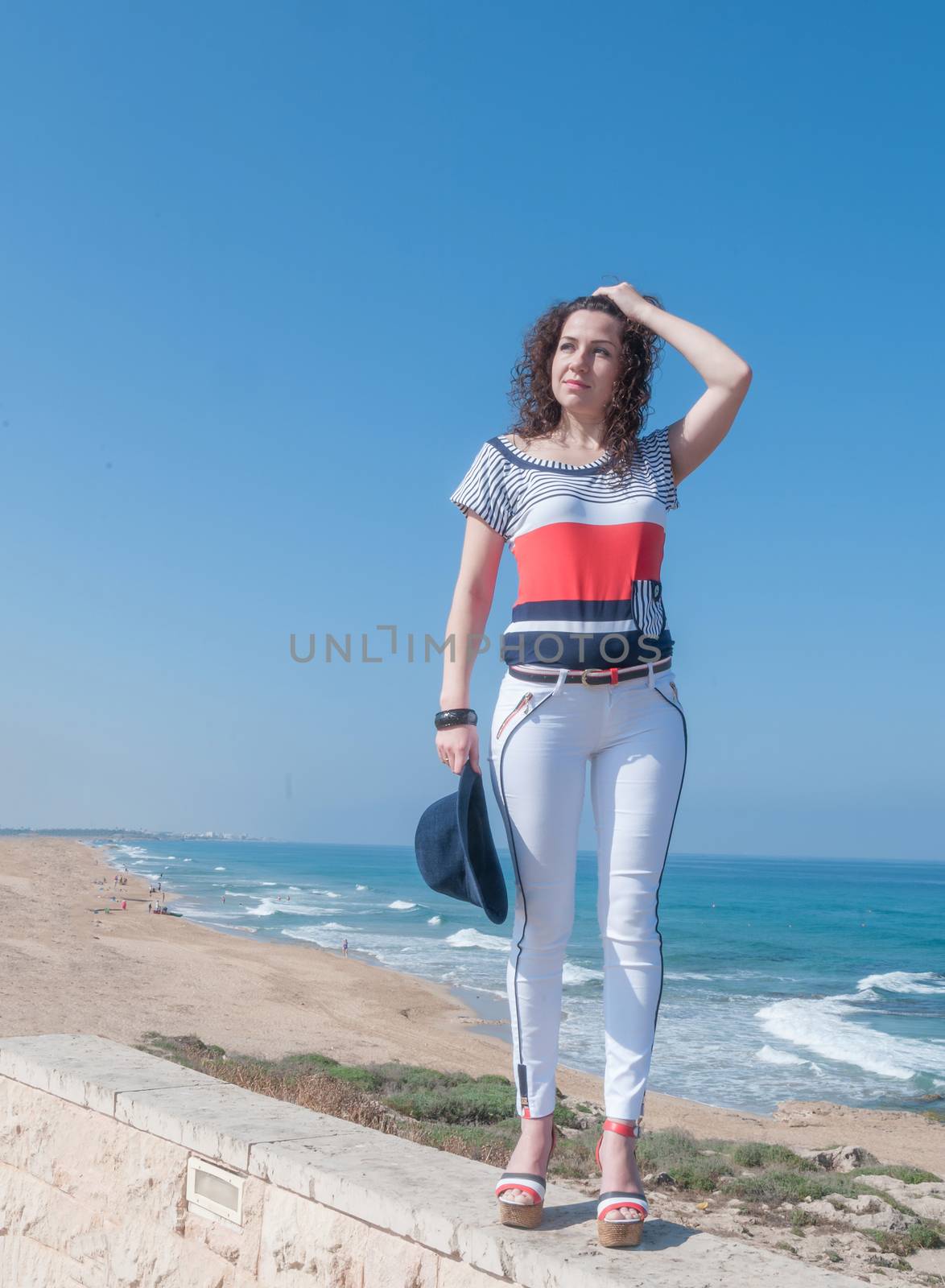 Girl in white jeans by the sea by ben44